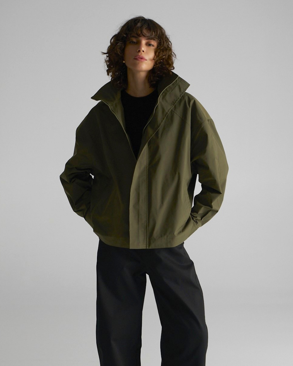 Mela Purdie Windbreaker Jacket in spruce green, packable lightweight outerwear